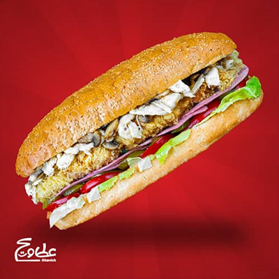 فیله مرغ سوخاری شده ، ژامبون گوشت ، قارچ ، پنیر موزارلا ، کاهو ، گوجه ، خیارشور و نان فرانسوی کنجدی ساندویچ ژامبو زینگر